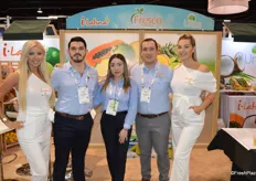 Hugo Rodriguez, Rebecca Garcia and Mauricio Lopez with Fresco Produce are being flanked by the company's i-Latina models.